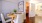 a dining room with a table and chairs