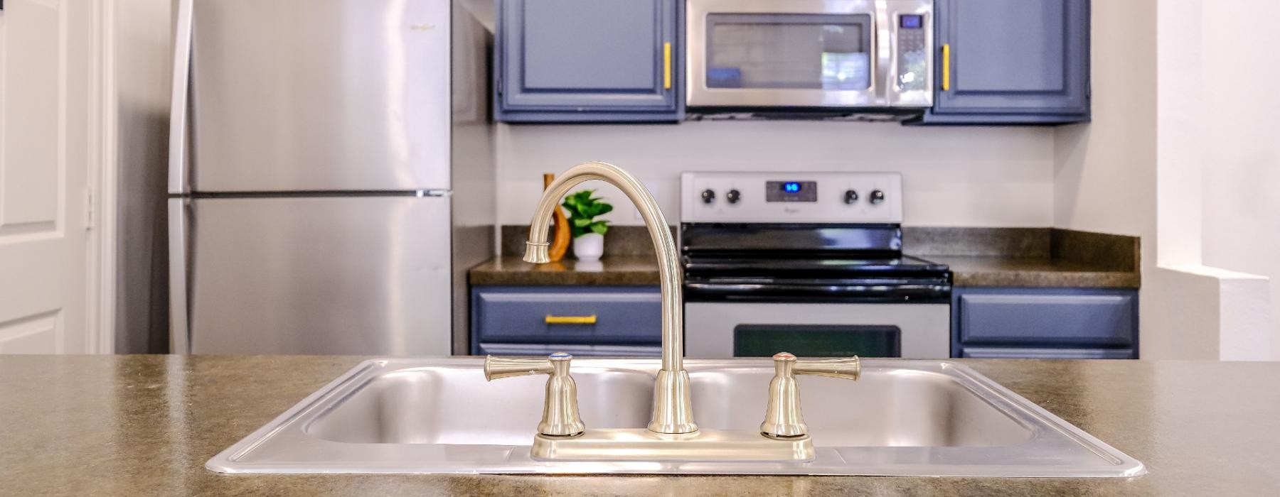 clubhouse kitchen with blue cabinets