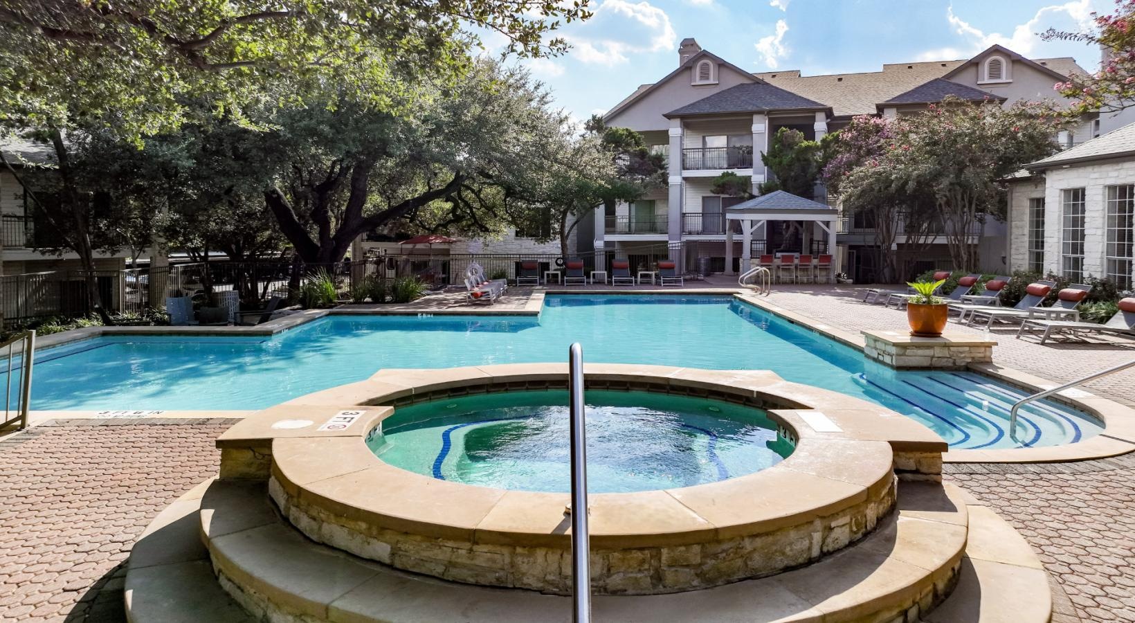 Sparkling swimming pool outdoor pool and jacuzzi