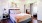 a bedroom with a large bed