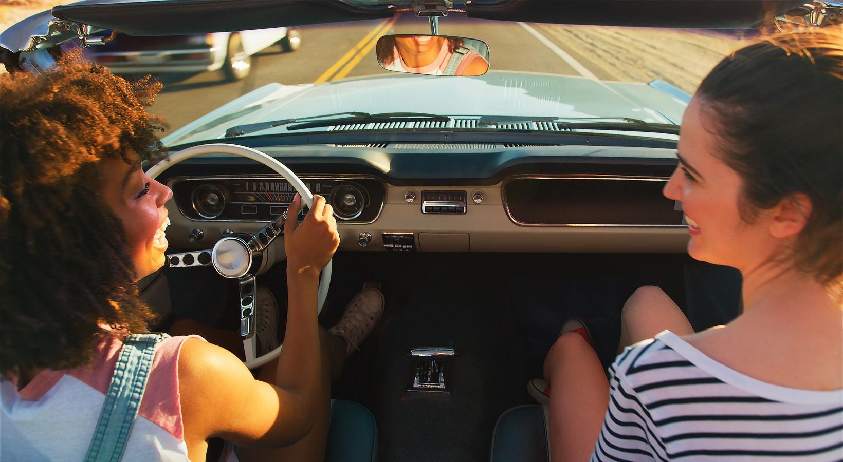 Close to the center of everything a person driving a car