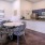 dining tables in clubhouse next to kitchen