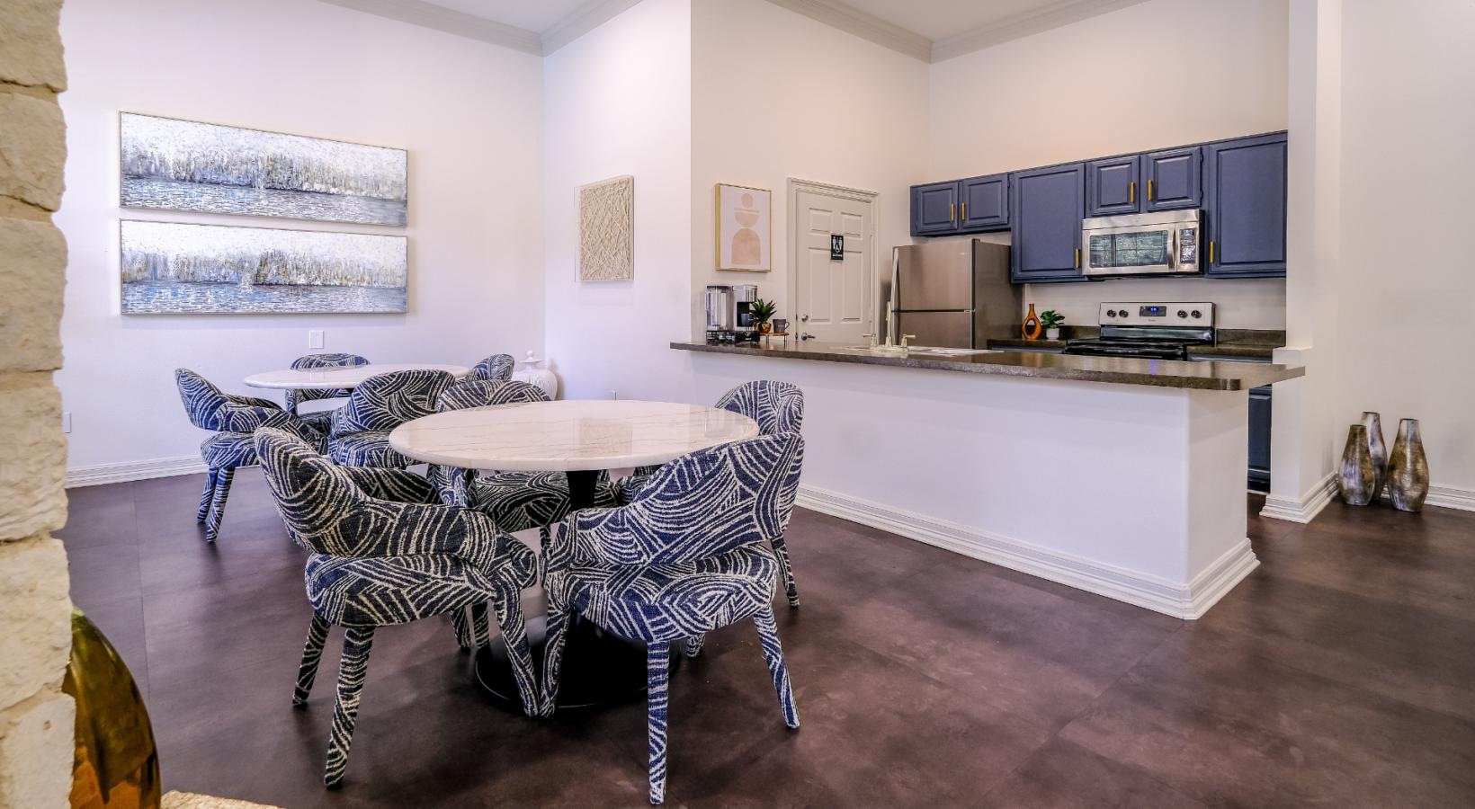 Take advantage of all San Marin Apartments has to offer dining tables in clubhouse next to kitchen