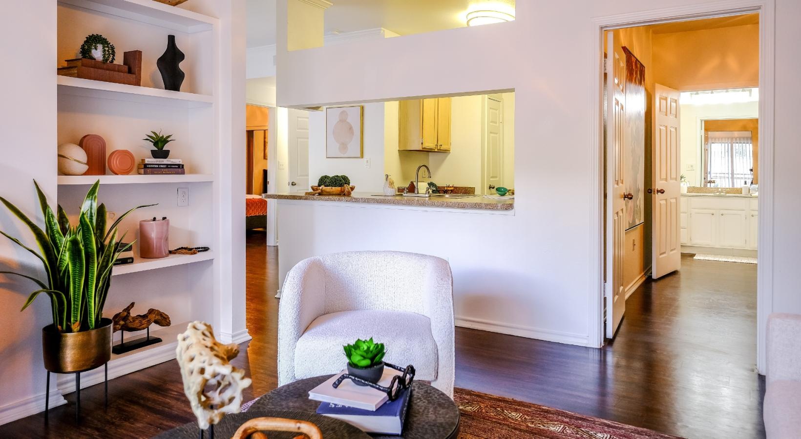 Spacious living areas to recline and recharge a living room with built-in bookshelves