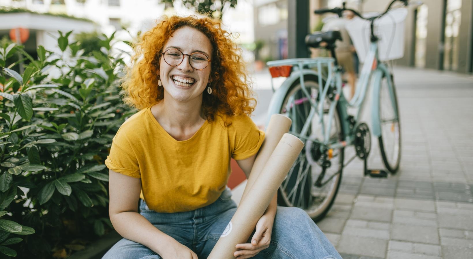 A beautiful community at the heart of all your passions a person sitting on a sidewalk