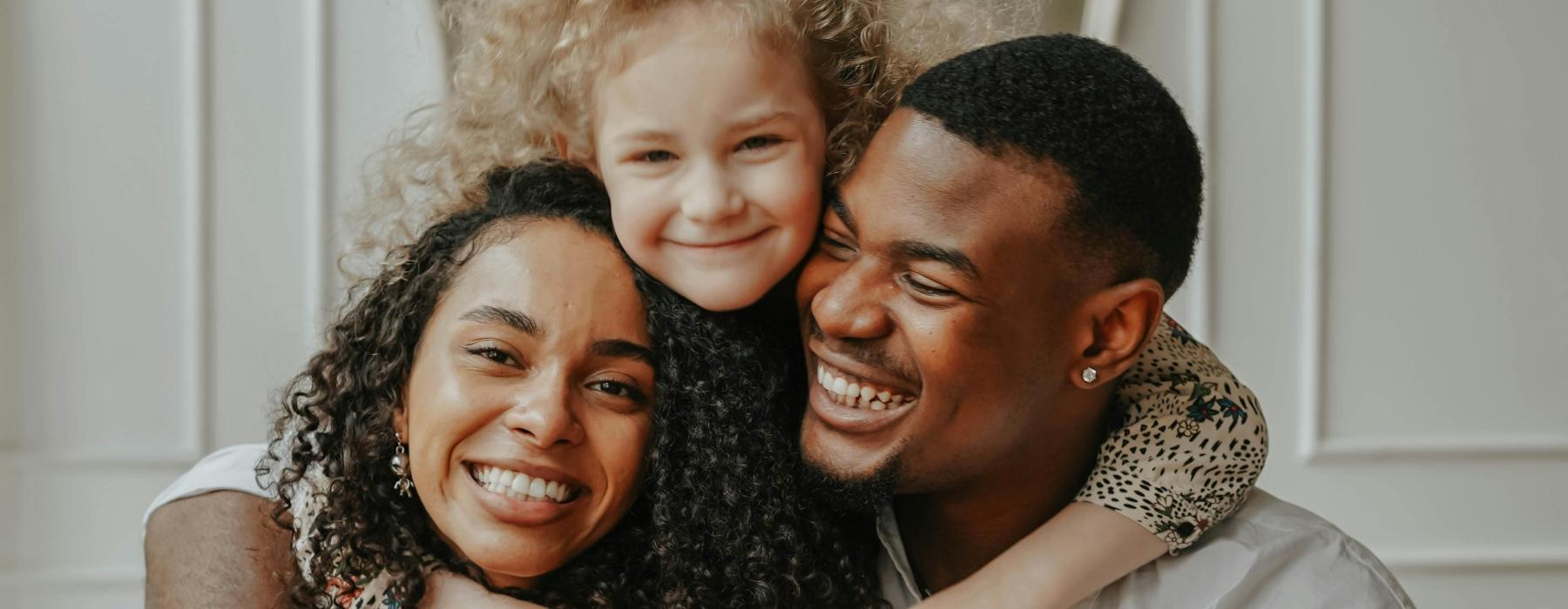 a man and woman with a child